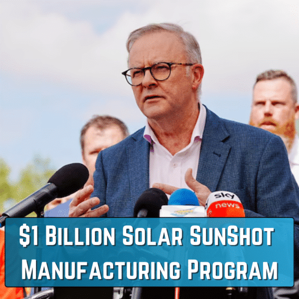 A man speaking at a podium about a $1 billion solar manufacturing program.