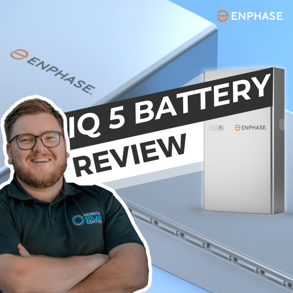 A man standing in front of a box with the words qi 5 battery review.