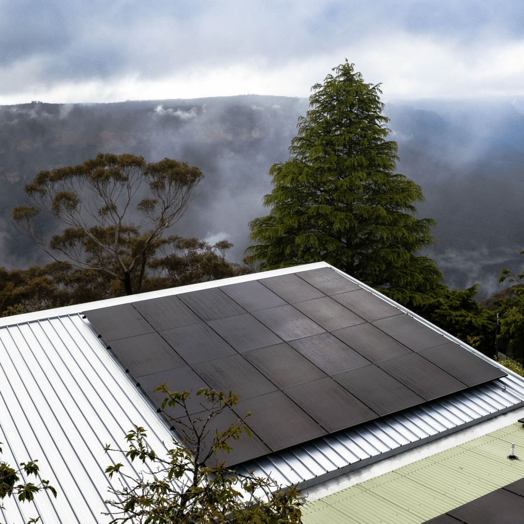 A solar panel on the roof of a house.