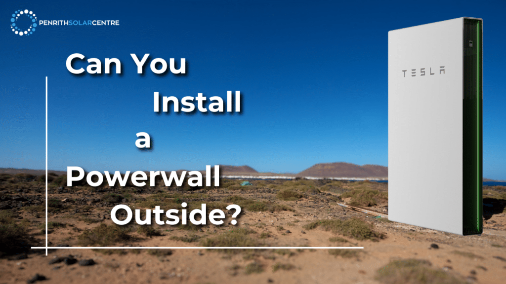 A Tesla Powerwall is installed outdoors in a desert landscape. Text on the image asks, "Can You Install a Powerwall Outside?" and displays the Penrith Solar Centre logo in the top left.