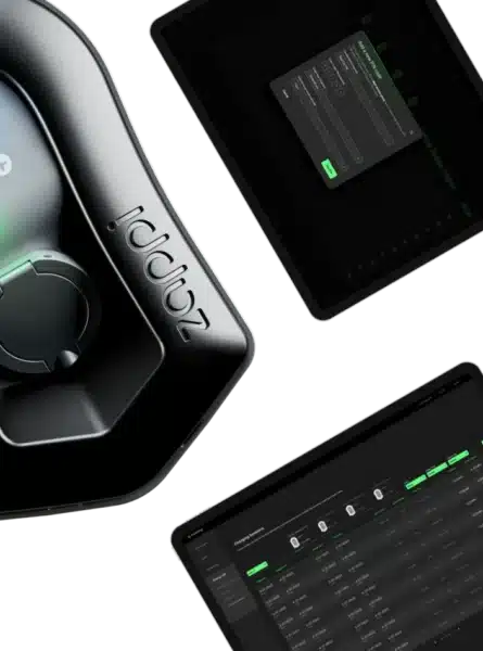 Close-up of a device labeled 'zappi' alongside two screens displaying user interface settings and data tables with green and gray themes.